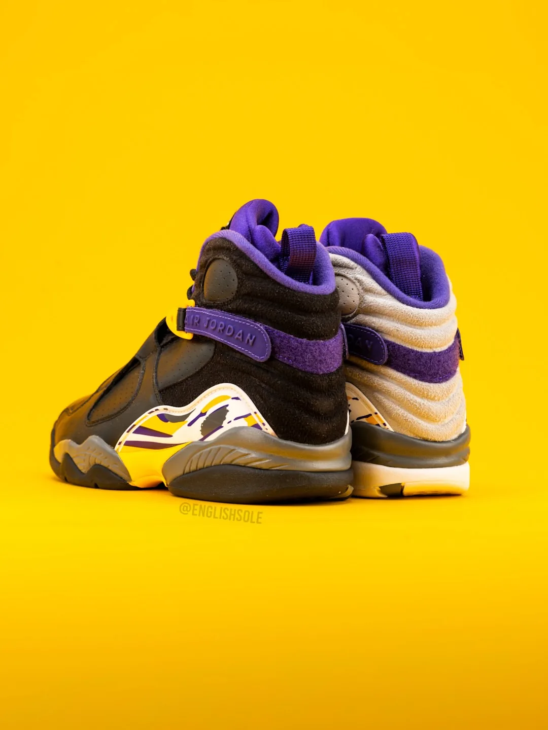 heel view of pair, black and grey uppers with purple straps, Bryant PE Pack