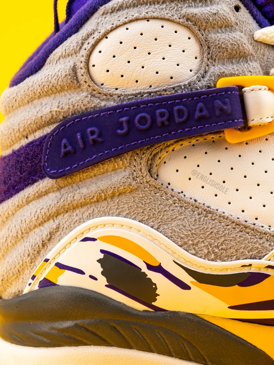 detail of heel strap, grey suede with air jordan text and yellow buckle, Bryant PE Pack