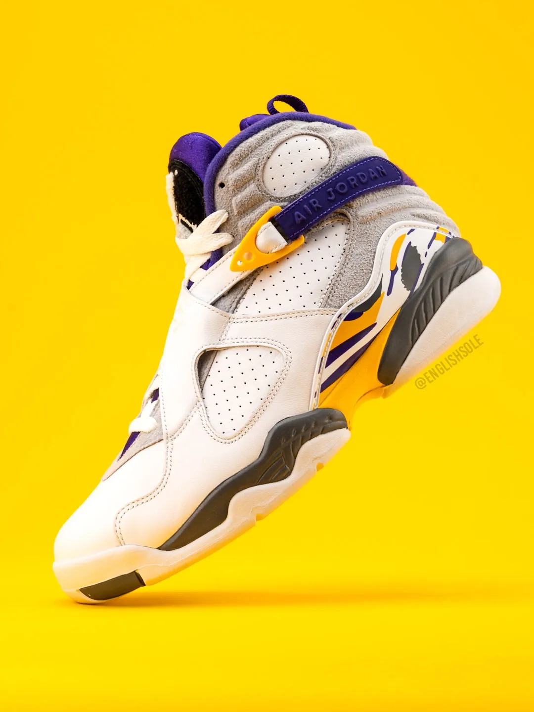 medial angled view, white/grey upper with yellow and purple accents, Bryant PE Pack