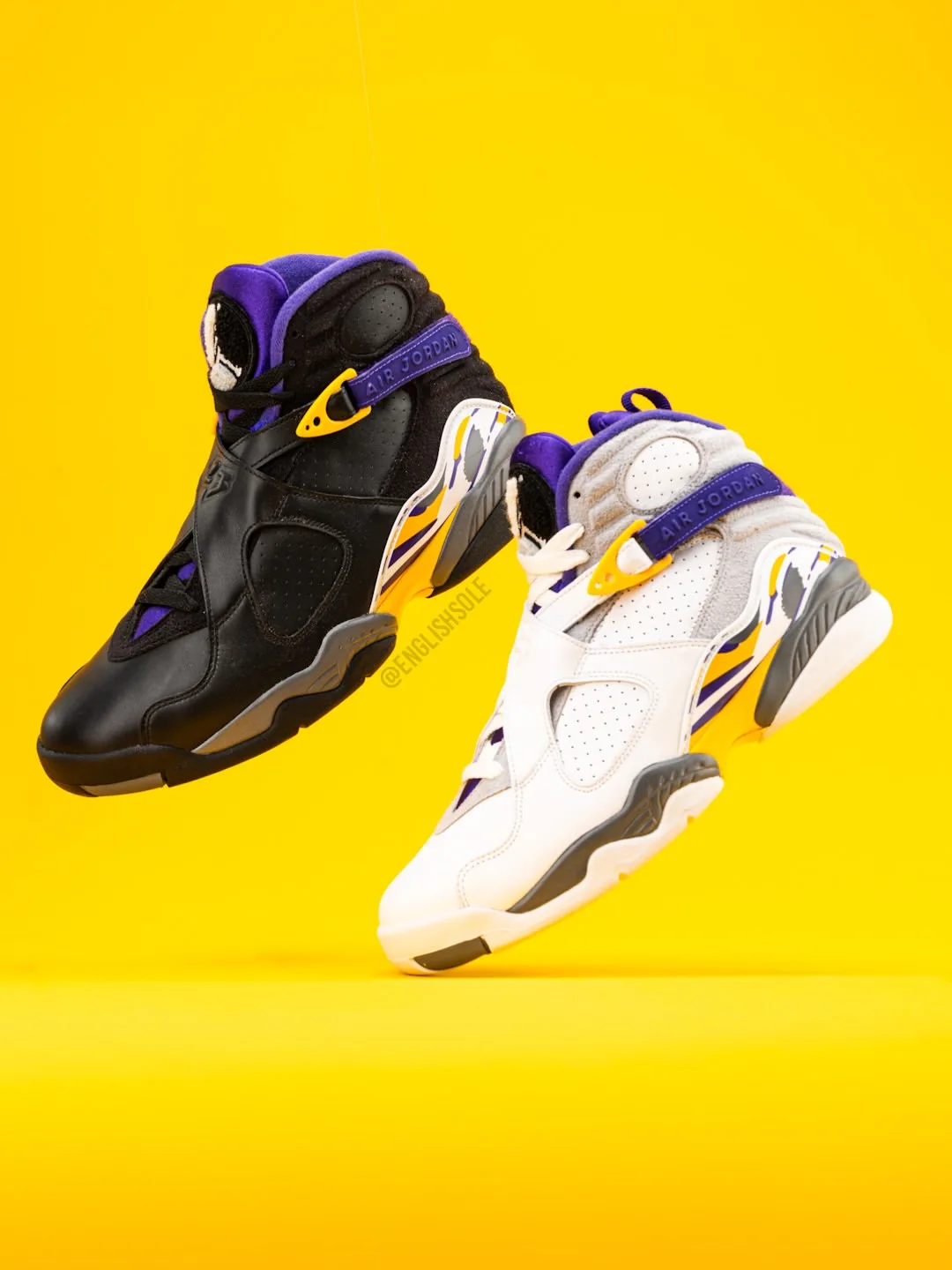 angled pair floating, black and white/grey uppers on yellow, Bryant PE Pack
