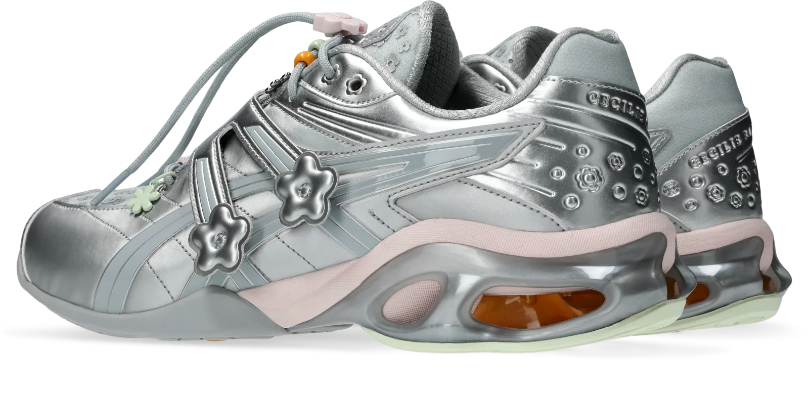 medial pair, silver uppers with flower charms and orange gel-window soles, ASICS GEL-Kinetic FR