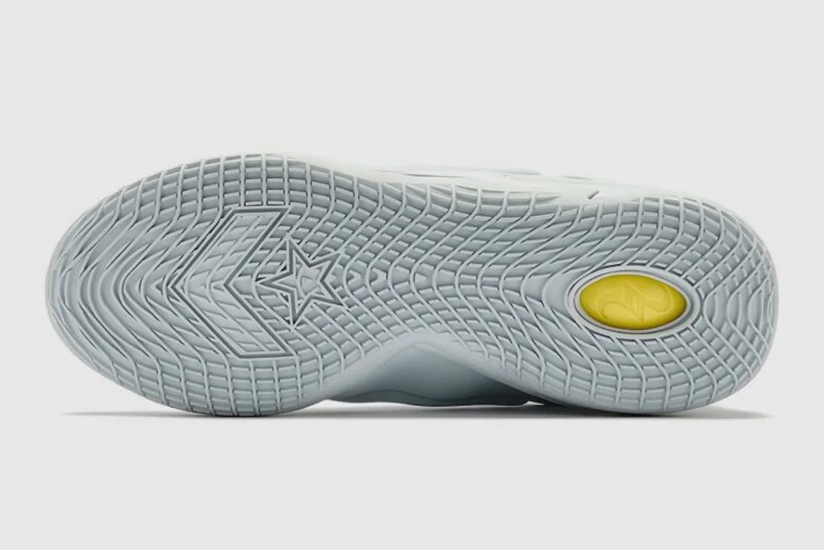 outsole view showing star and chevron tread with yellow heel pod, Ghosted