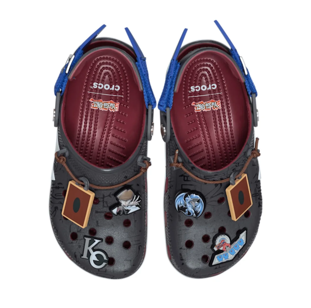 top-down pair, black clog with burgundy insole and KC logo charm, x Crocs Collection