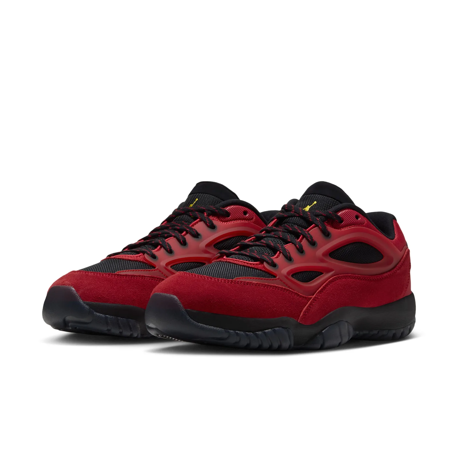Three-quarter pair view, red suede toes, black mesh, yellow Jumpman on tongues, Reverse Bred