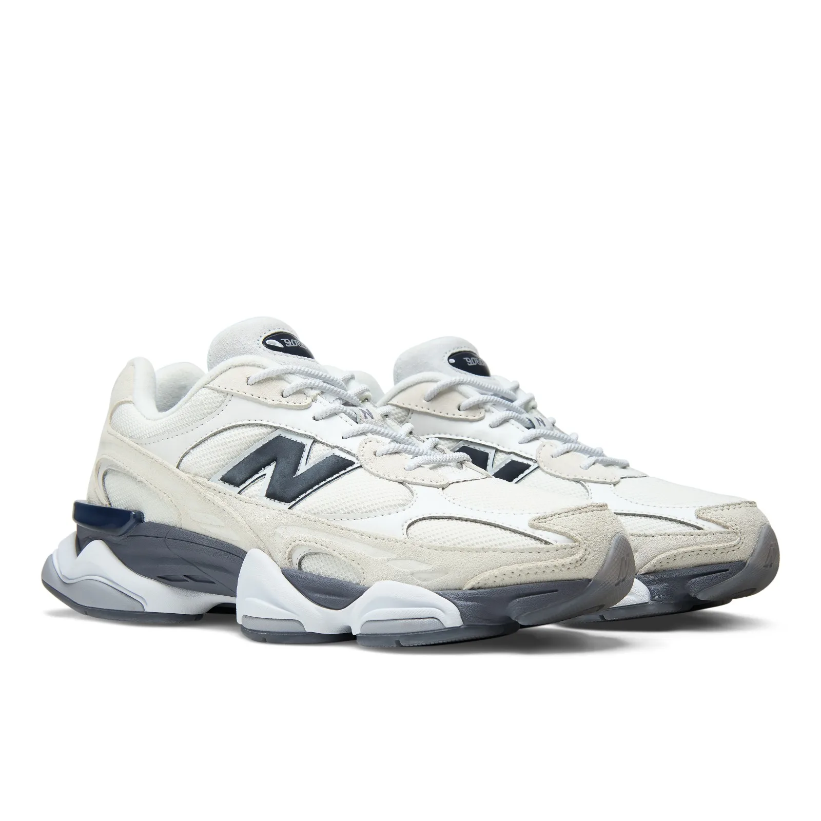 angled pair view, off-white with navy heel tab and grey suede overlays, New Balance 9060R