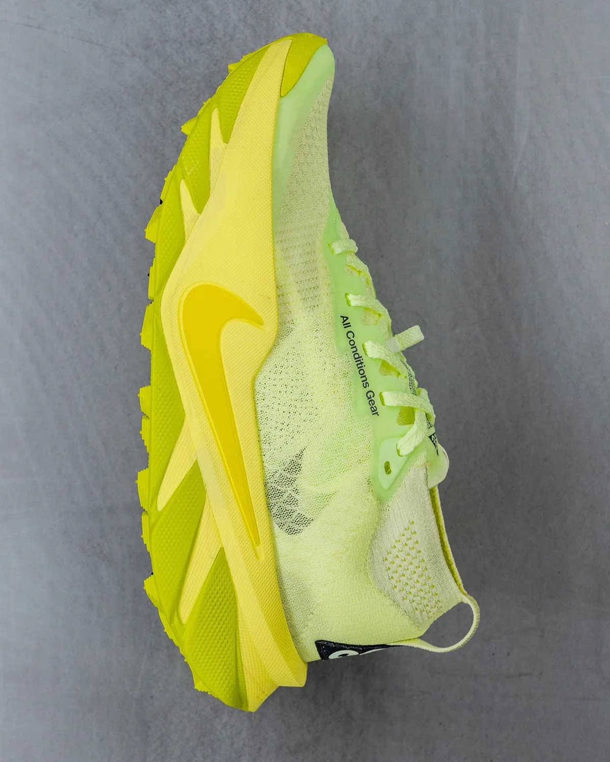 Lateral view, yellow mesh upper with Nike swoosh and All Conditions Gear text, Nike ACG Picklejus