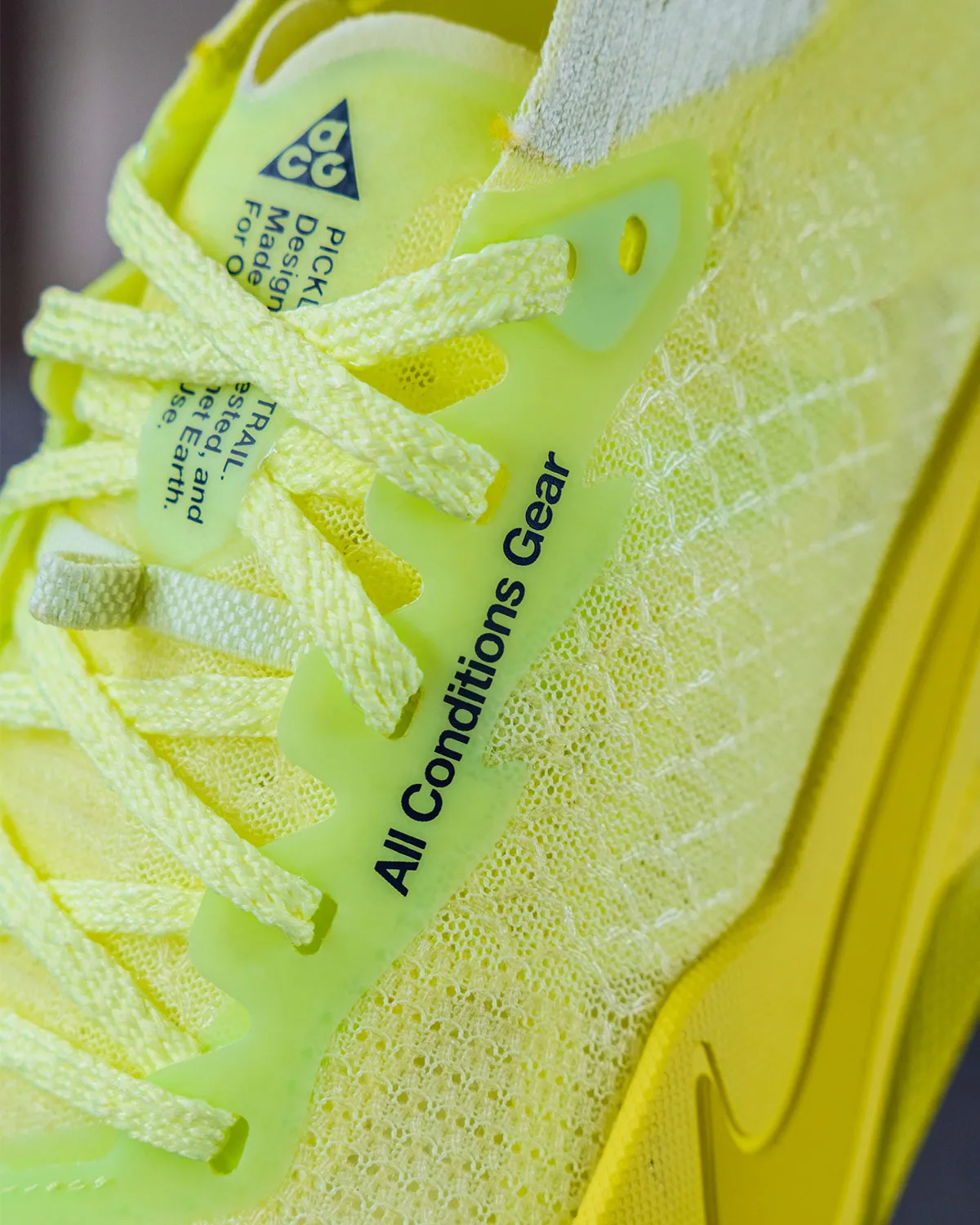 Close-up of tongue tag reading All Conditions Gear, with ACG triangle logo, Nike ACG Picklejus