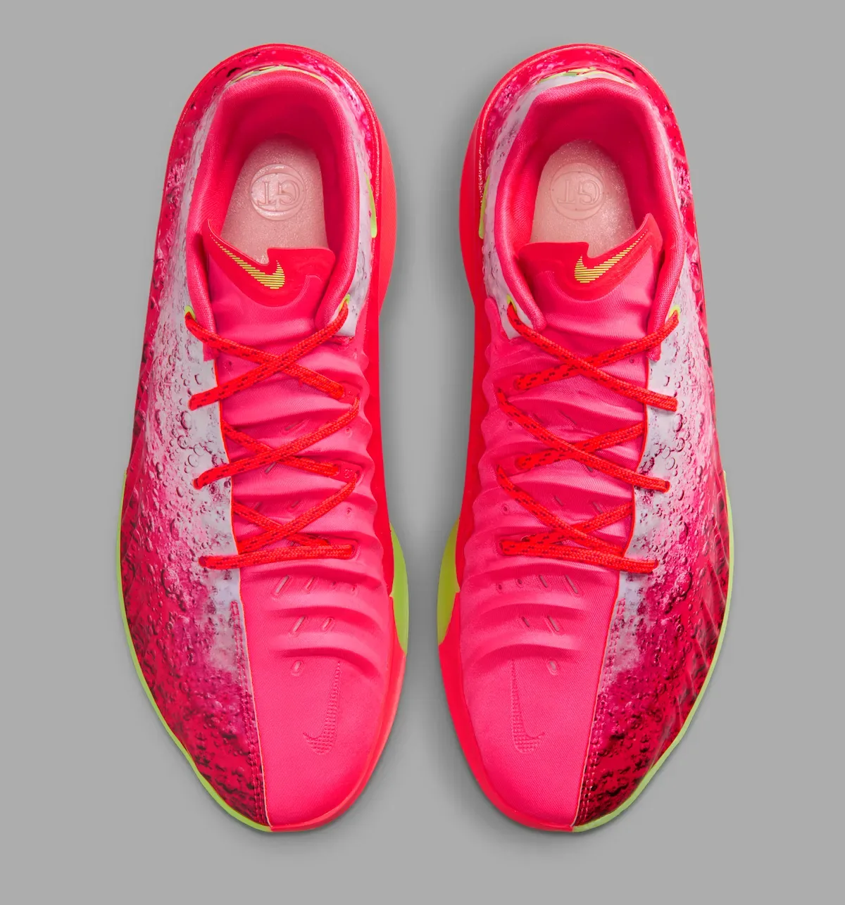 Top-down look at the red laces, GT insoles, and cherry-soda forefoot graphic on the Paige Bueckers shoes