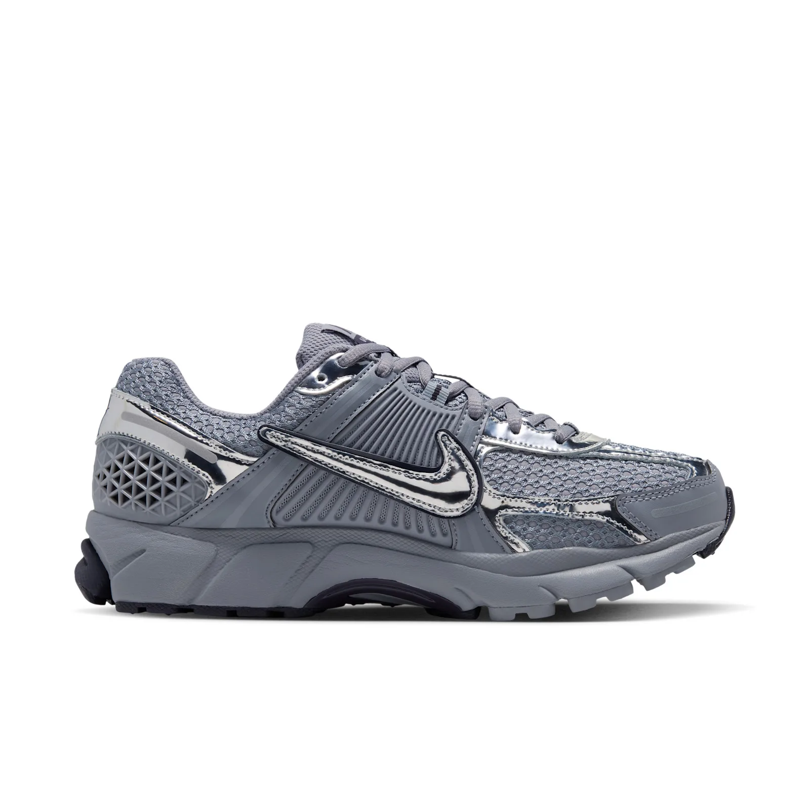 lateral view, grey mesh with silver swoosh and dark navy midsole trim, Gridiron