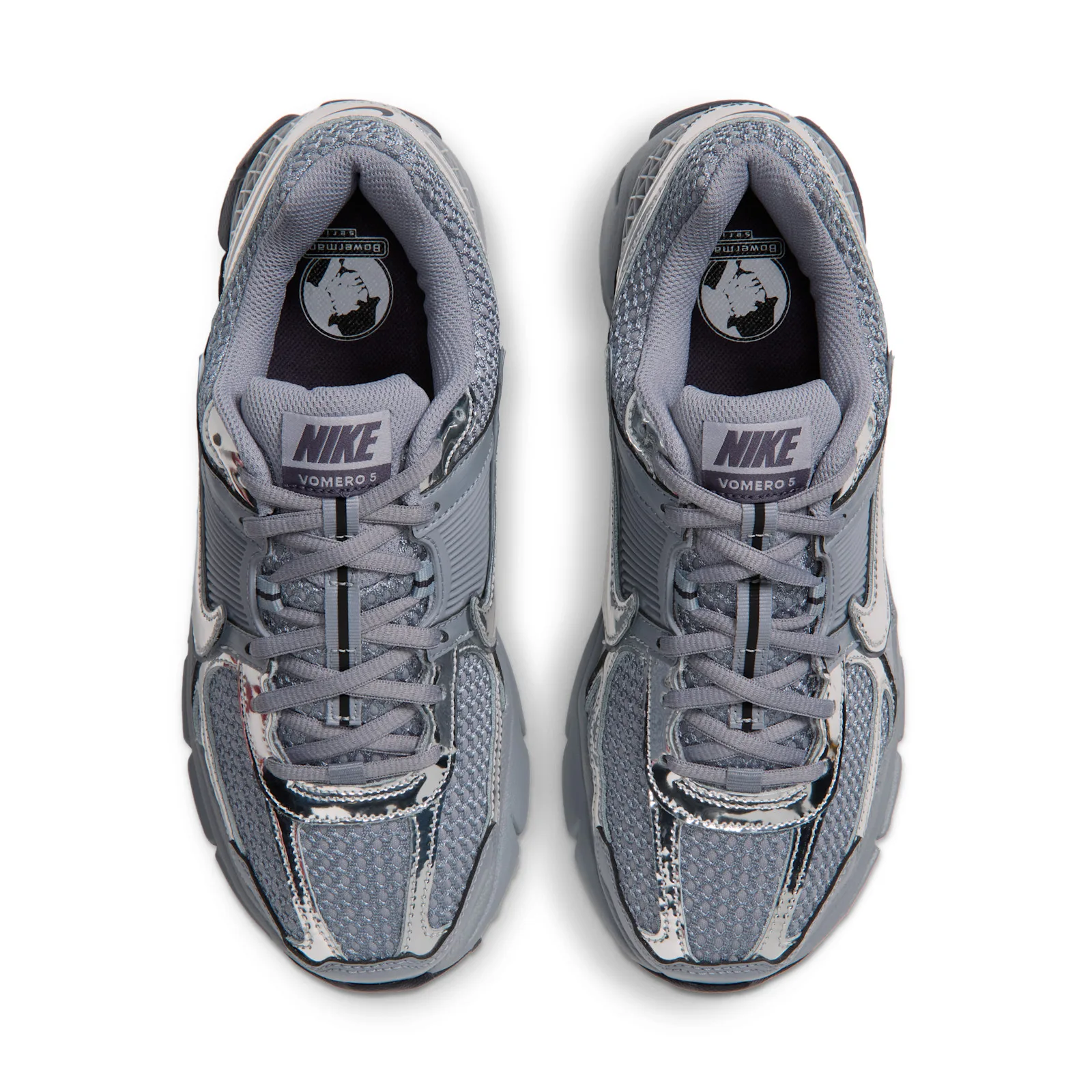 top-down pair view, grey mesh uppers with Nike Vomero 5 tongue label, Gridiron
