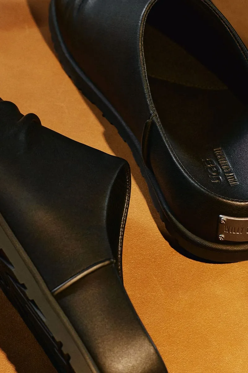 close-up heel tag reading Willy Chavarria on a black leather mule, Willy Chavarria Collection