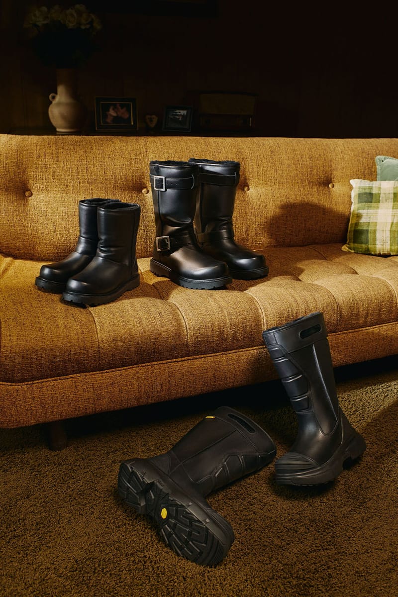 pair of ankle boots and tall buckle boots on a couch, boots on floor below, Willy Chavarria Collection