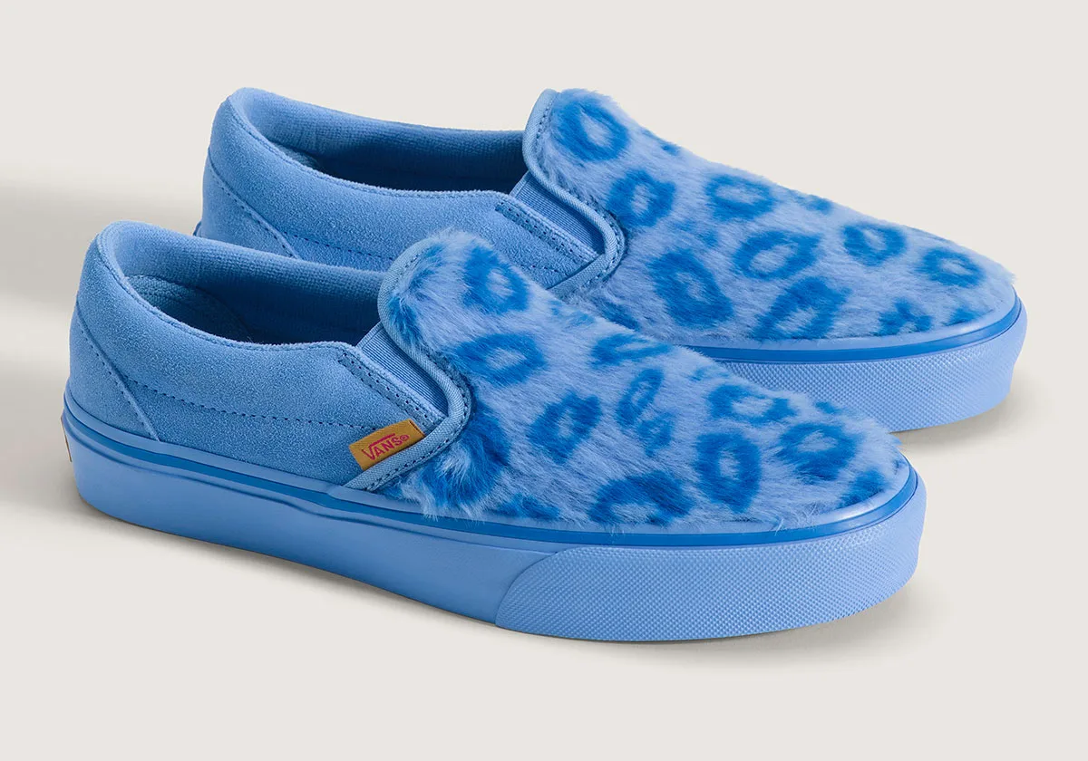 angled pair view, blue faux-fur leopard print slip-ons with blue suede backs, Demon Hunters Collection