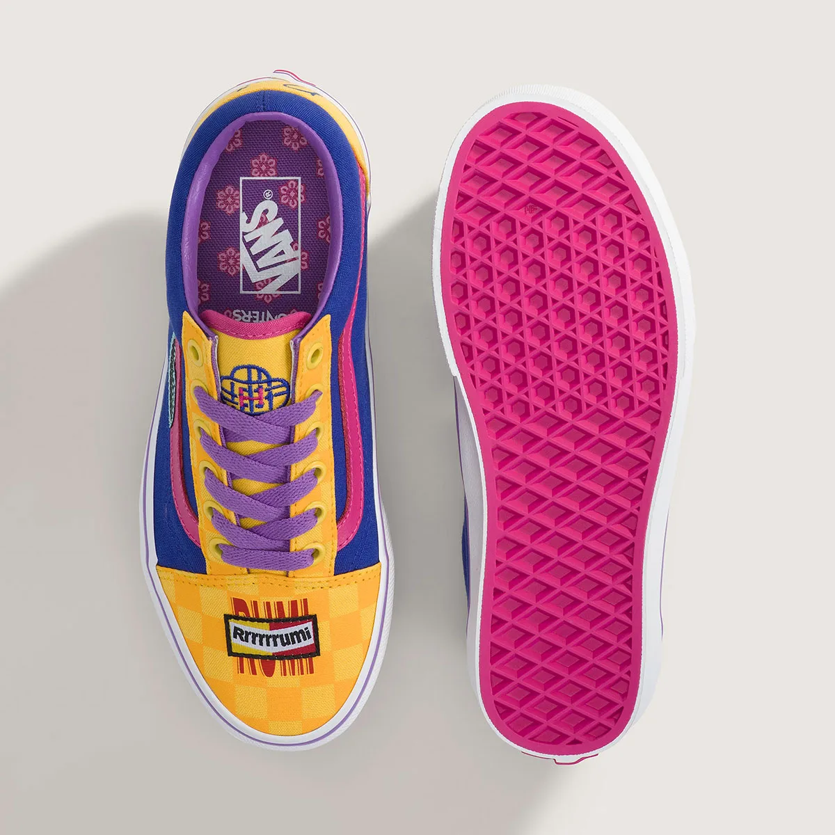 top-down pair with pink and white outsole, yellow/blue upper and floral insole, Demon Hunters Collection