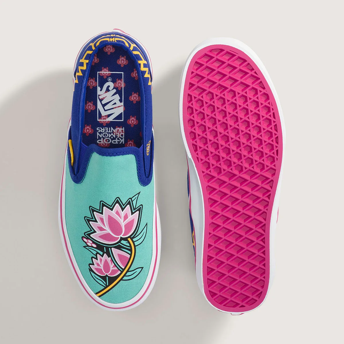 top-down pair with pink outsole, mint lotus graphic upper and branded insole text, Demon Hunters Collection
