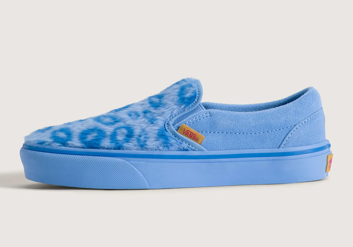 lateral view, blue faux-fur leopard print slip-on with blue suede heel and sole, Demon Hunters Collection