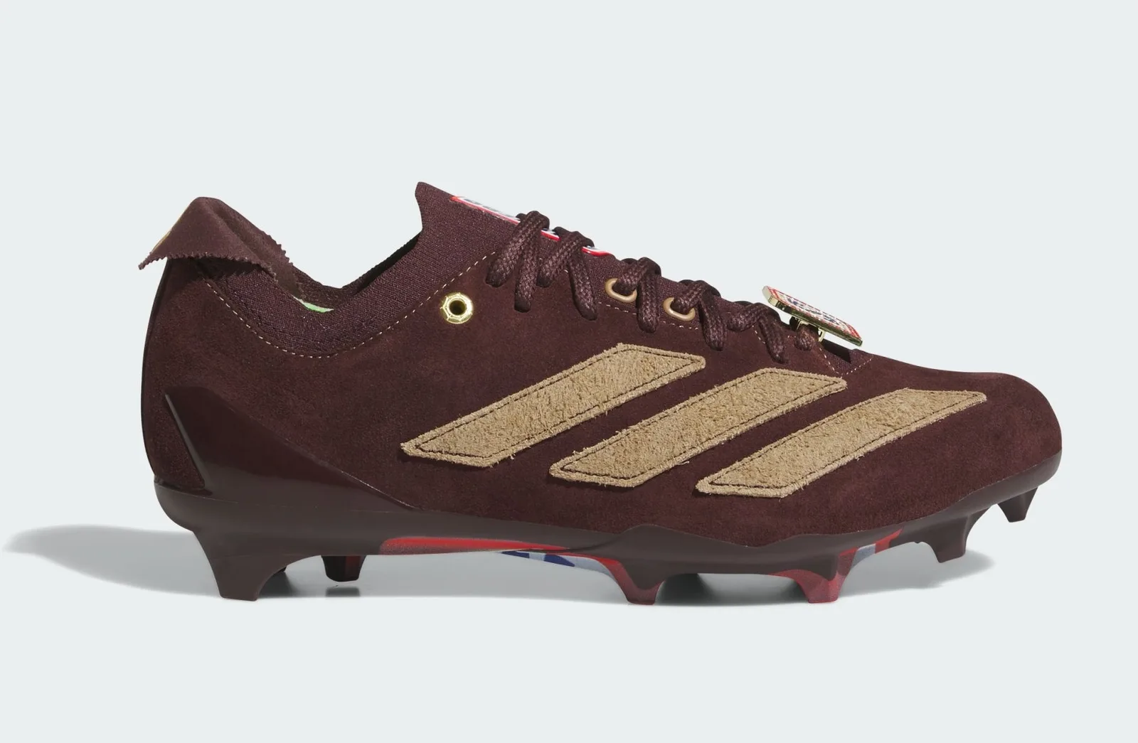 lateral view on plain background, maroon suede with tan suede stripes, II x Snickers