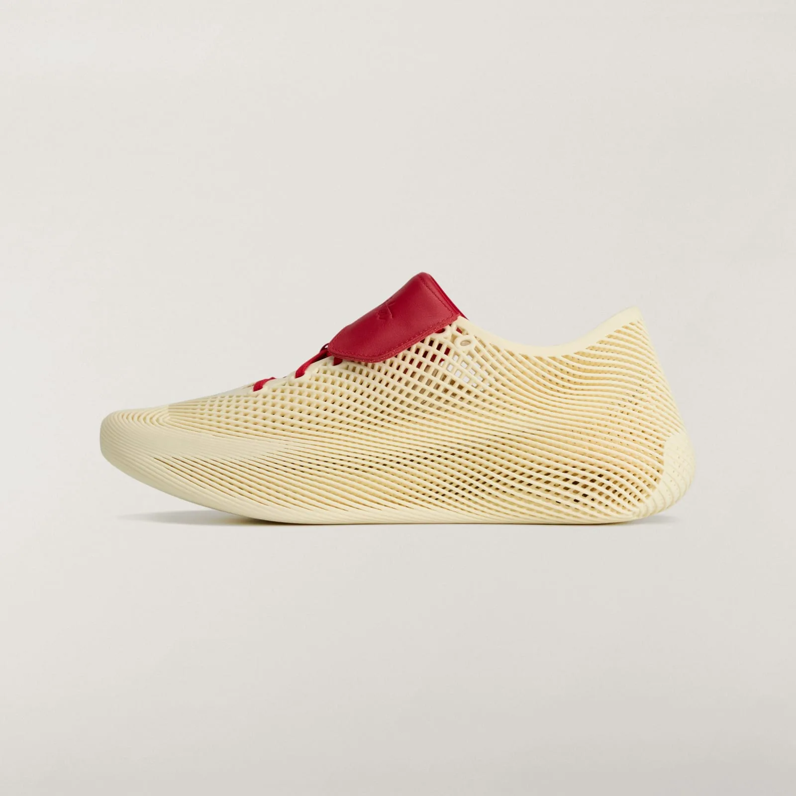 medial view, cream mesh upper, red laces and red leather heel tab, no stripes, Collegiate Red