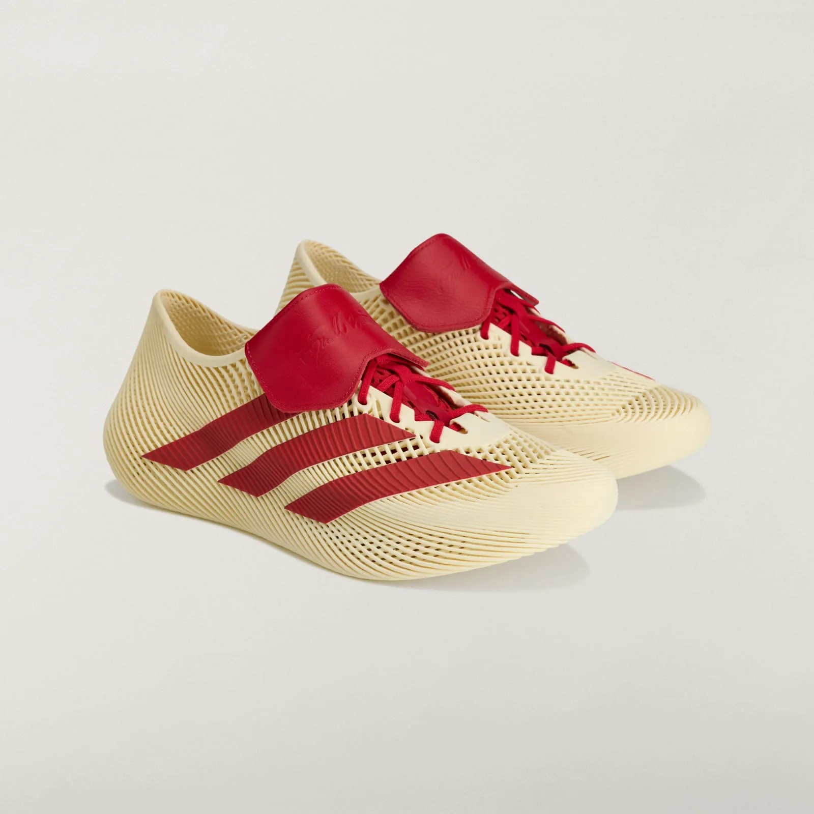 pair, angled front view, cream mesh uppers with red stripes and heel tabs, Collegiate Red