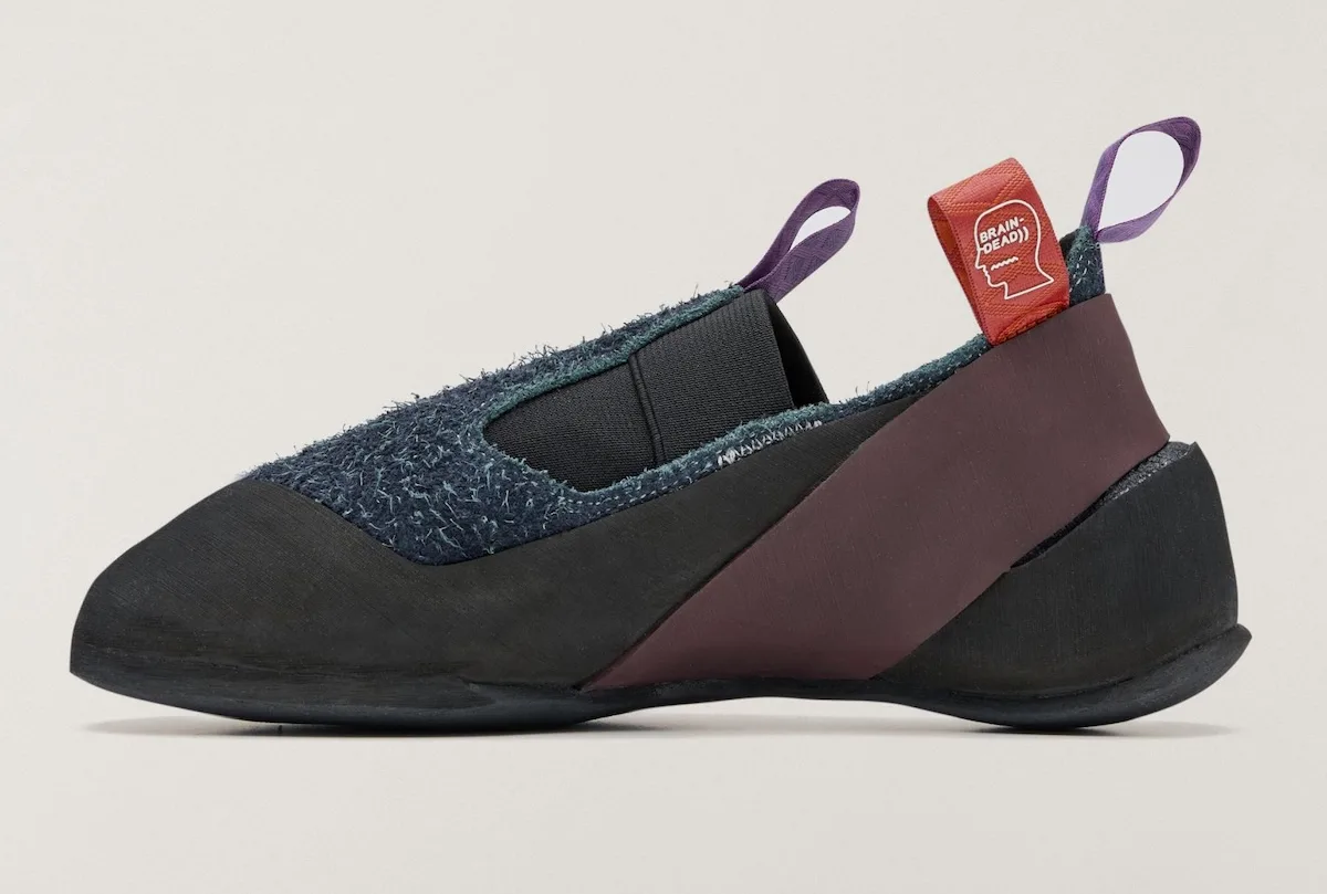 medial view of navy hairy-suede slip-on with maroon heel wrap and red Brain Dead tab, Approach and Niad