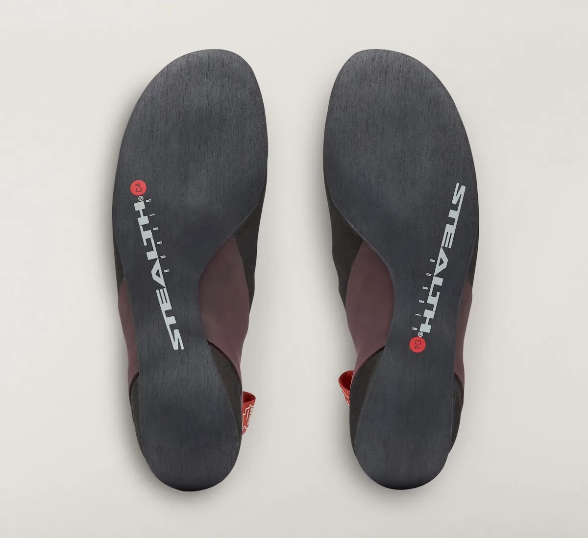 outsole view of navy slip-on pair showing Stealth C4 rubber tread, Approach and Niad