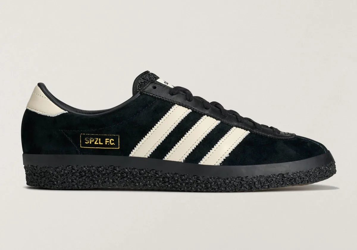 lateral view, black suede, cream 3-stripes, gold SPZL F.C. branding on toe, Gazelle SPZL FC