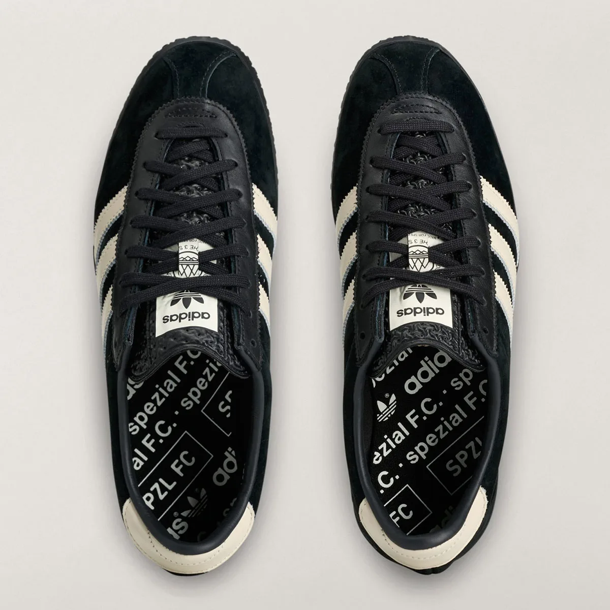 top-down pair view showing black laces, cream stripes and branded black insoles, Gazelle SPZL FC