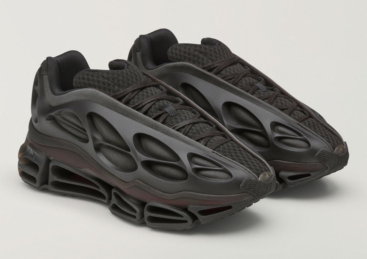 three-quarter angle of black leather mid-top pair with cage-lattice midsole, Willy Mega Mid)