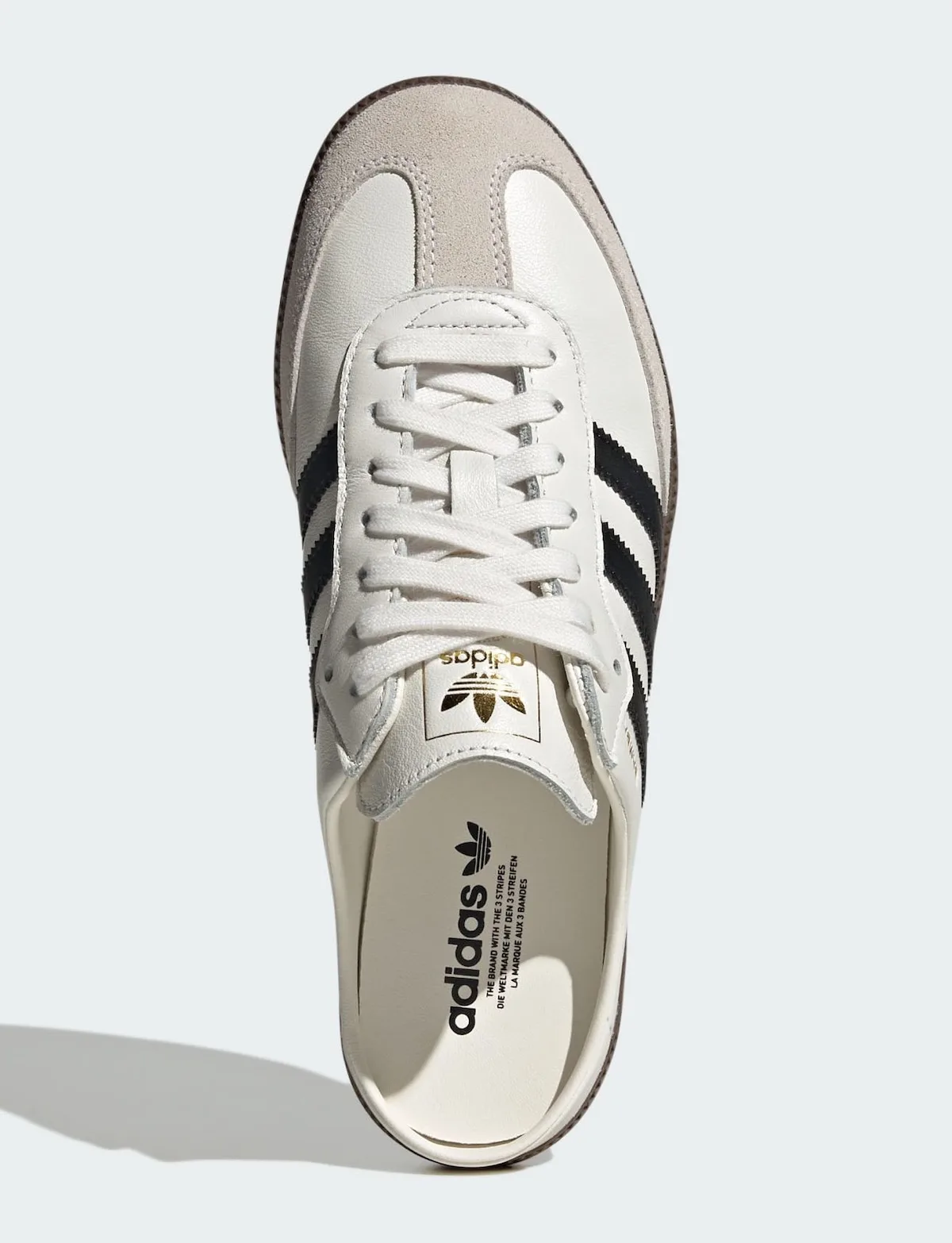 top-down view of white upper, black stripes and gold trefoil logo, adidas Samba Mule