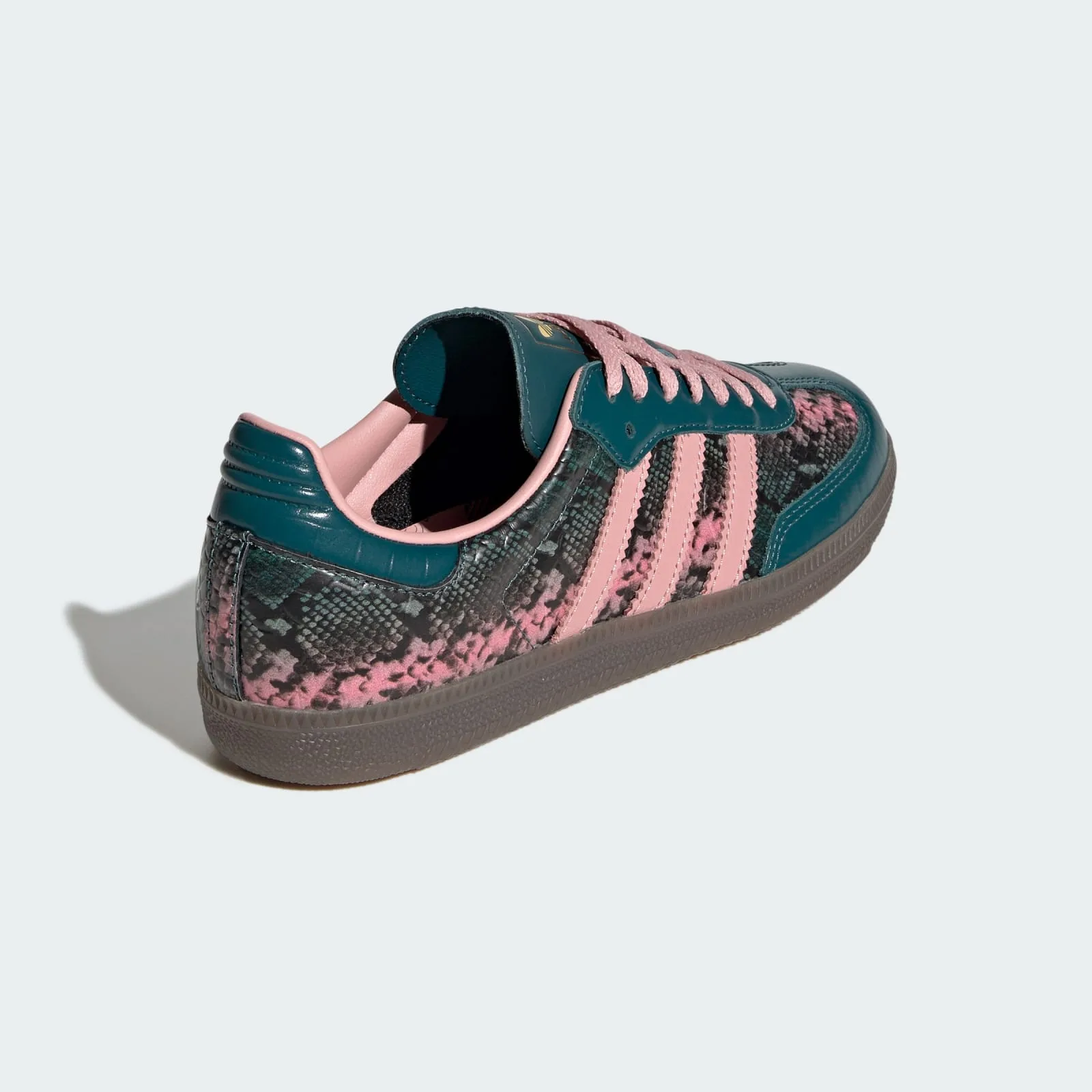 rear three-quarter view, teal heel tab and snakeskin heel with pink stripes, Teal Snakeskin