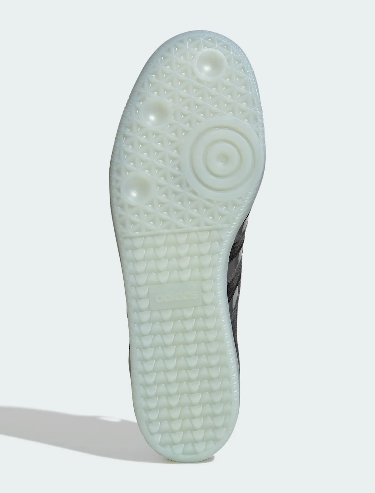 outsole view, translucent white tread with concentric heel pods, x TTT MSW