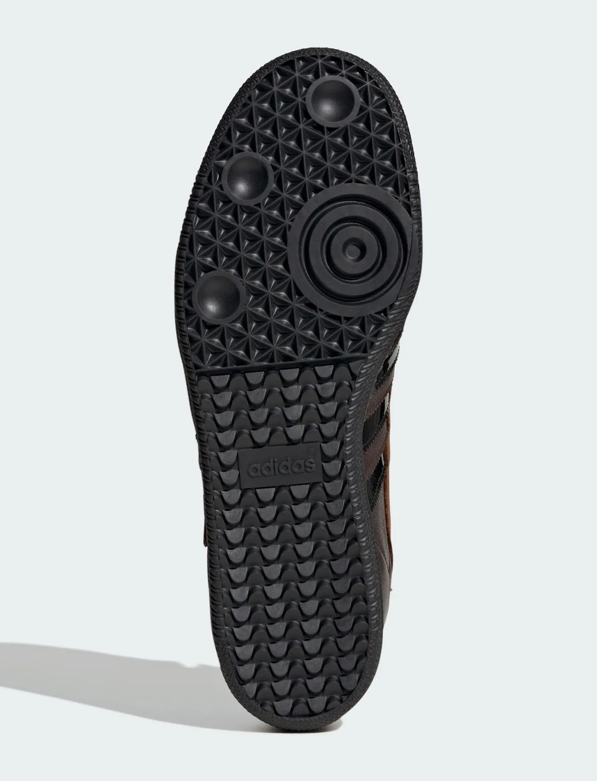 outsole view, black tread with concentric heel pods and adidas wordmark, x TTT MSW