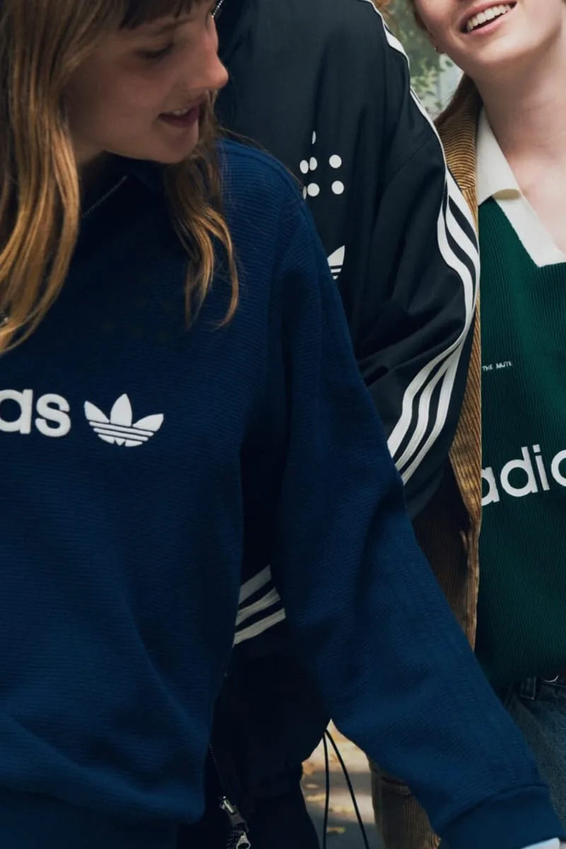 cropped group wearing navy, black and green adidas branded tops, PRO SFTM 011)