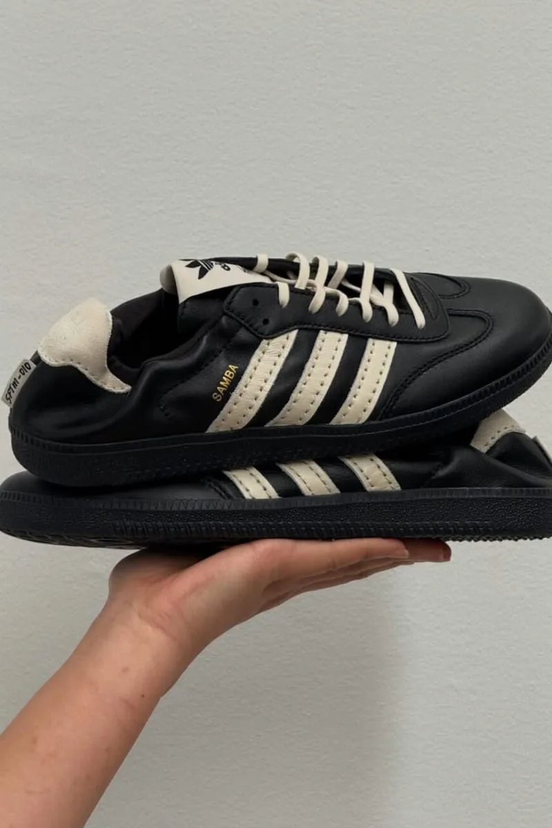 in-hand pair, black leather with cream stripes and white SFTM-010 tag, PRO SFTM 011)