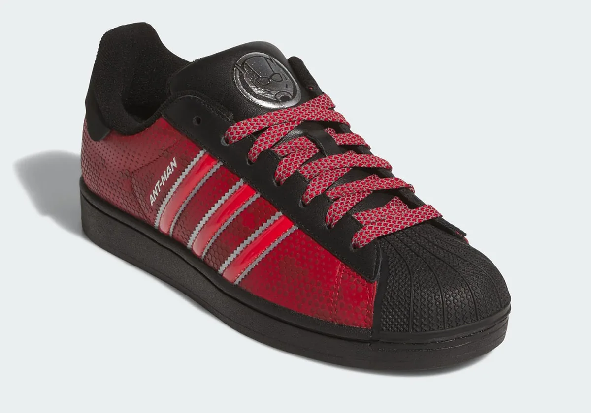 lateral view, red upper with black toe and red-and-silver stripes reading Ant-Man, Avengers: Doomsday