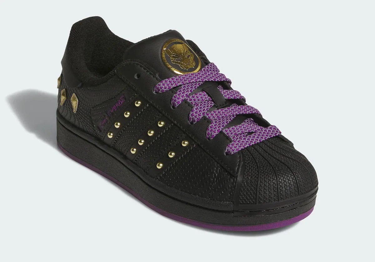 lateral view, black upper with purple studded stripes and gold panther badge, Avengers: Doomsday
