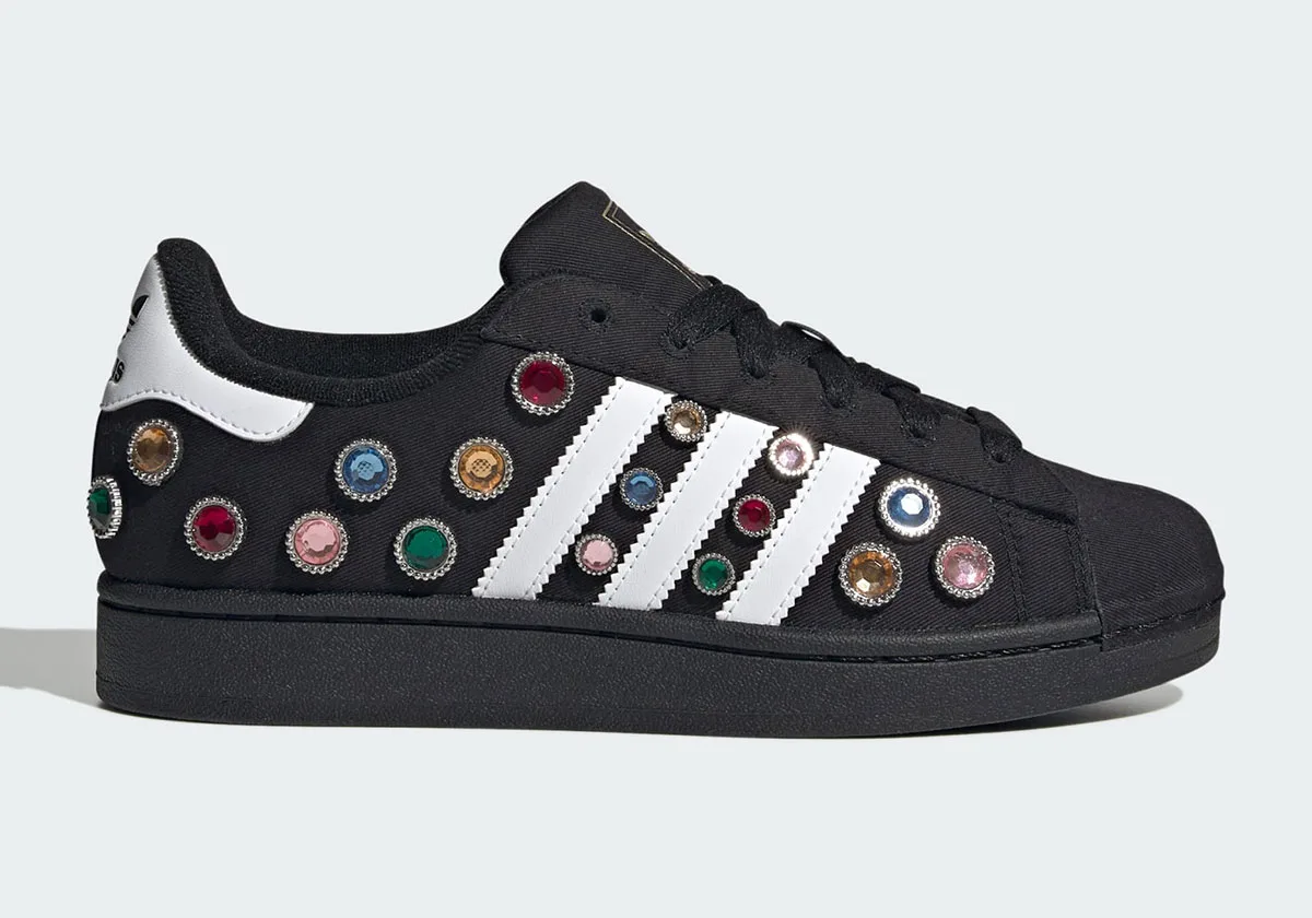 lateral view, black canvas upper studded with multicolour gems and white stripes, Jewel