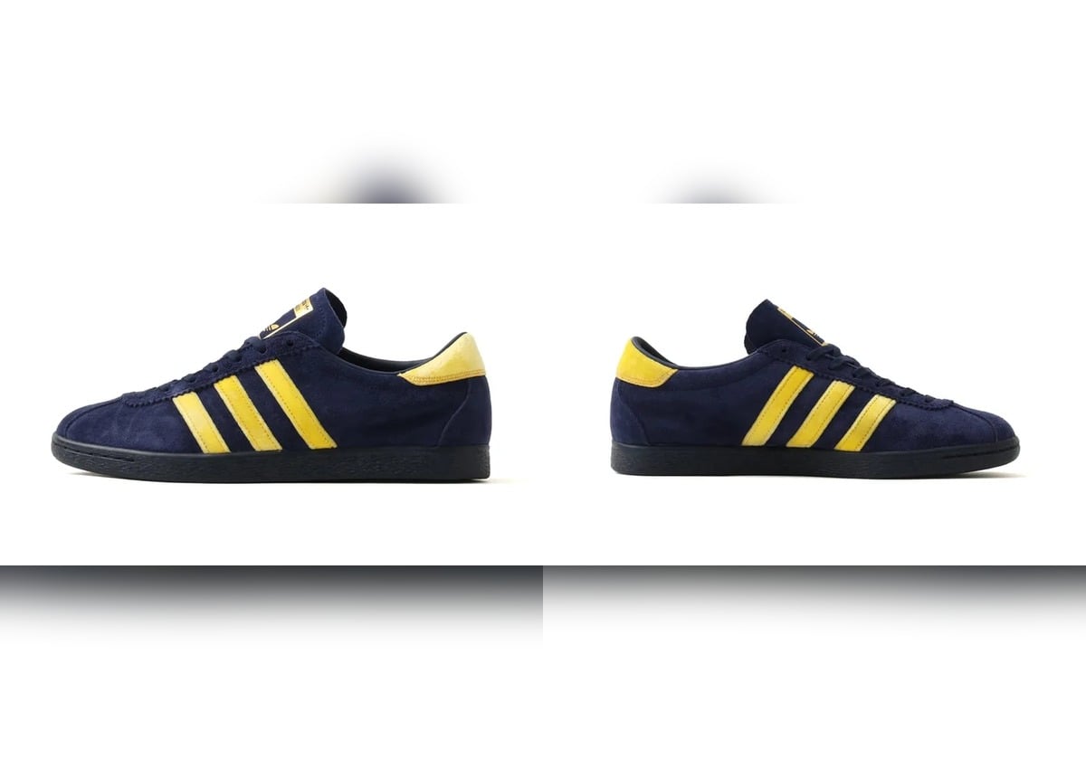 split lateral views of both shoes, navy suede with yellow stripes, KOYO