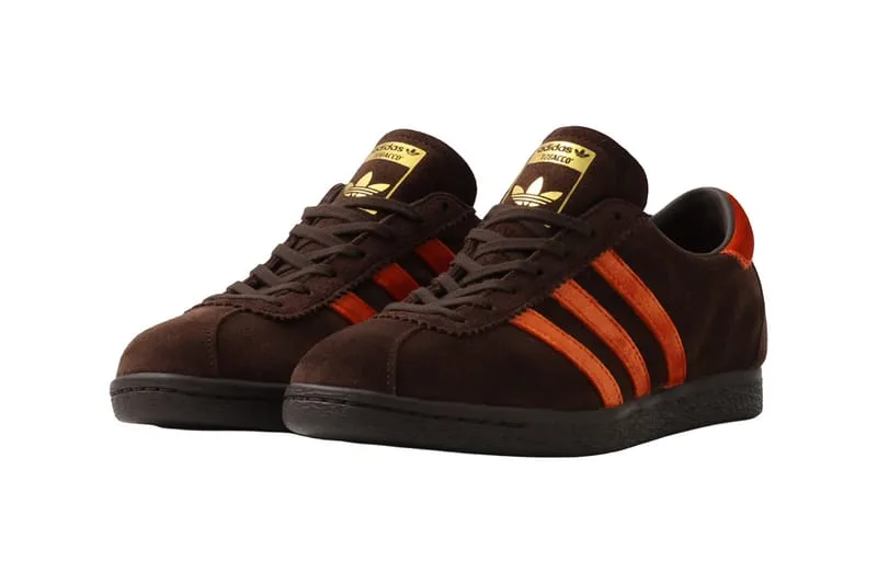 3/4 view pair, brown suede upper with orange stripes and gold branding, KOYO