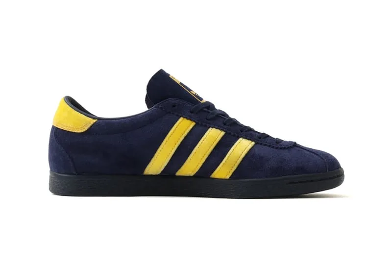 lateral view, navy suede upper with yellow stripes and black sole, KOYO