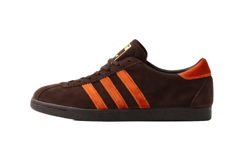 lateral view, brown suede upper with orange stripes and gold branding, KOYO