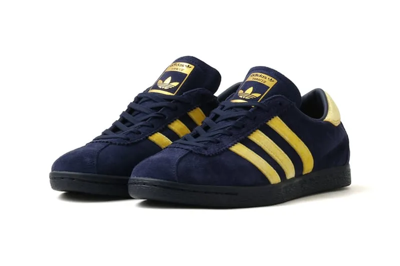 lateral pair, navy suede upper with mustard yellow stripes and black sole, adidas Tobacco x atmos “KOYO” in Navy, Brown