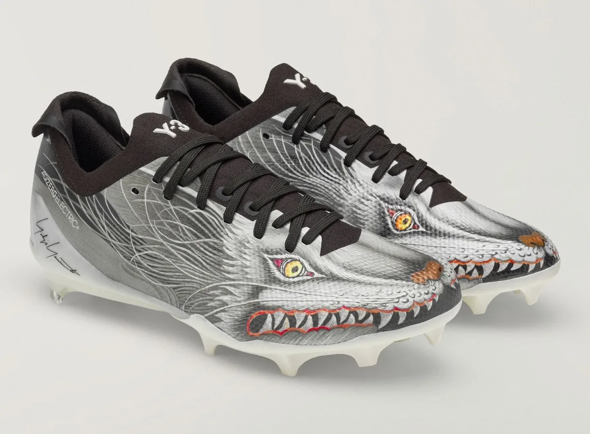 Pair, grey wolf graphic cleats angled toe-forward on white background, Beast