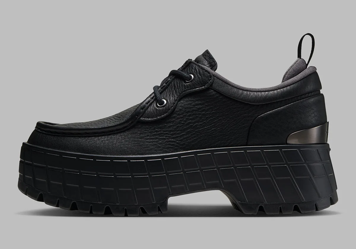 lateral view, black leather moc-toe upper on chunky black lugged platform sole, Jordan 1 Brooklyn