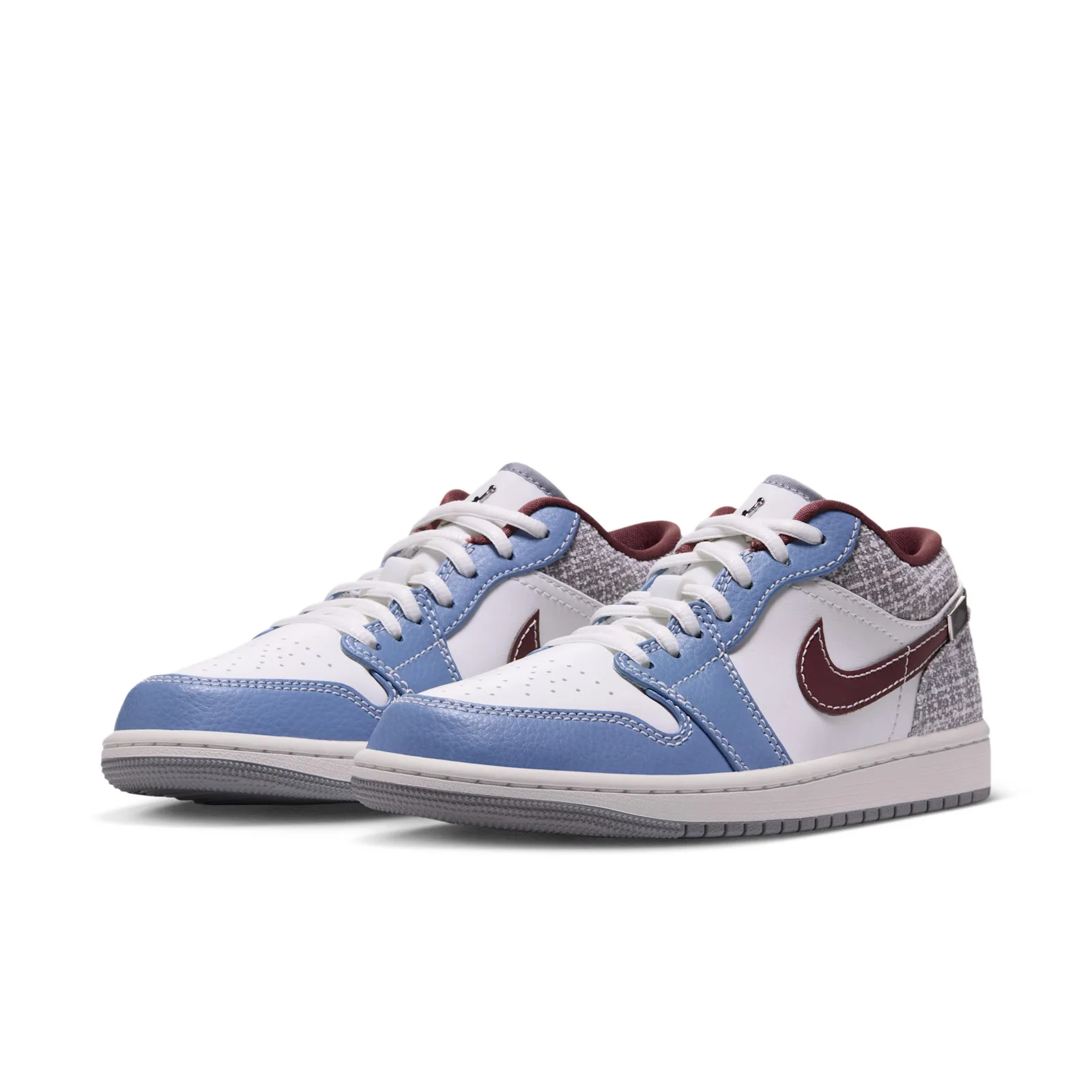 Pair at three-quarter angle, blue toe caps, maroon swooshes, tweed heels, Bouclé