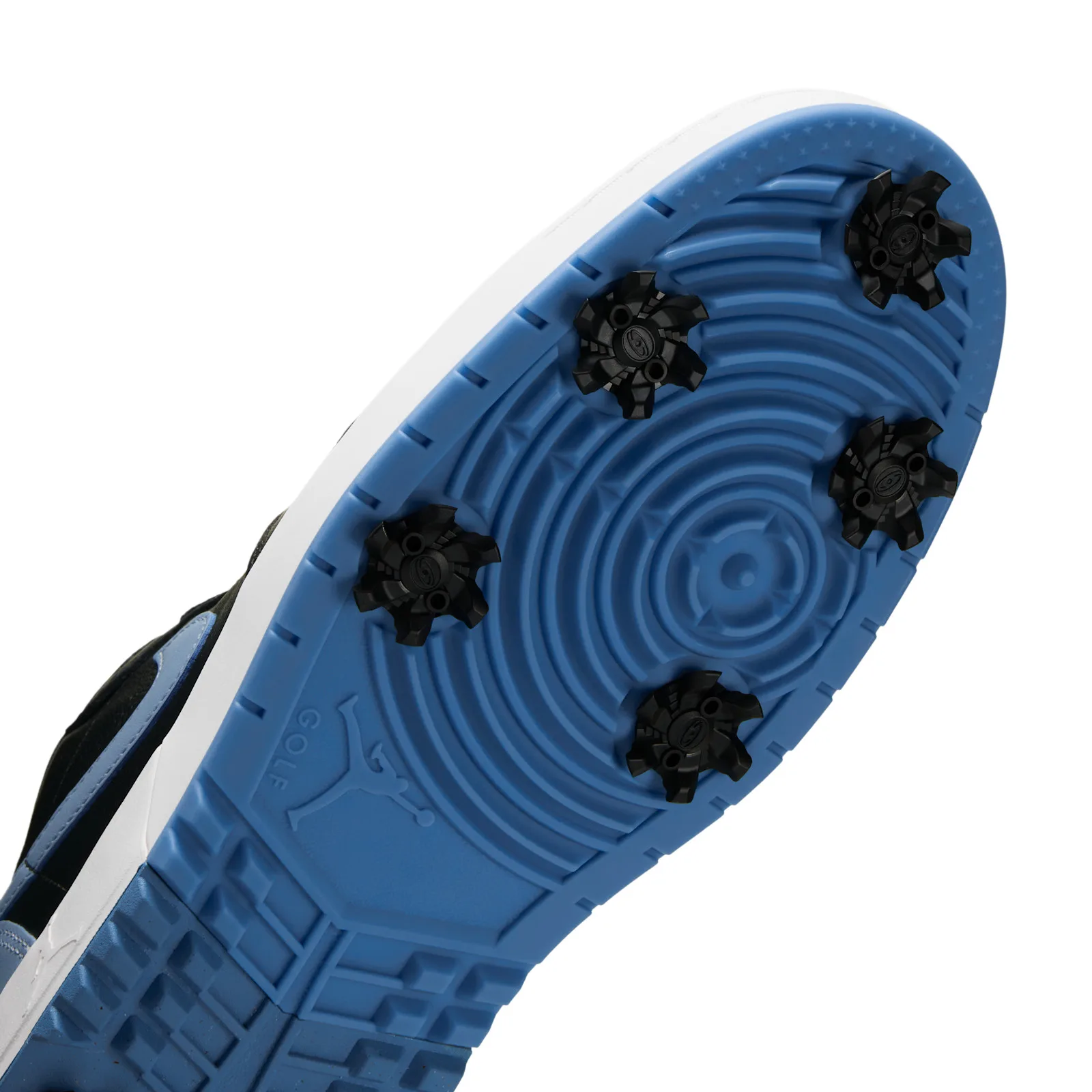 close-up angled outsole view, black spikes set in blue cleated rubber with Jordan Golf text, Chambray