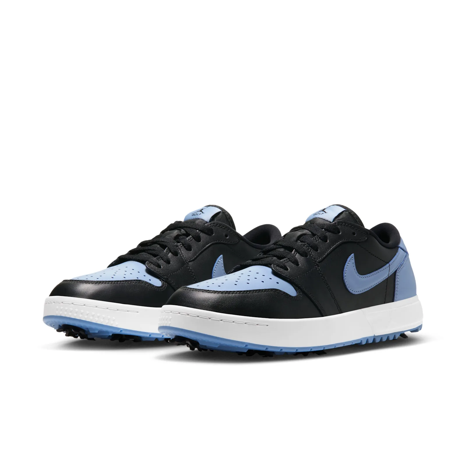 three-quarter pair view, black and blue uppers with white midsoles and blue cleated soles, Chambray
