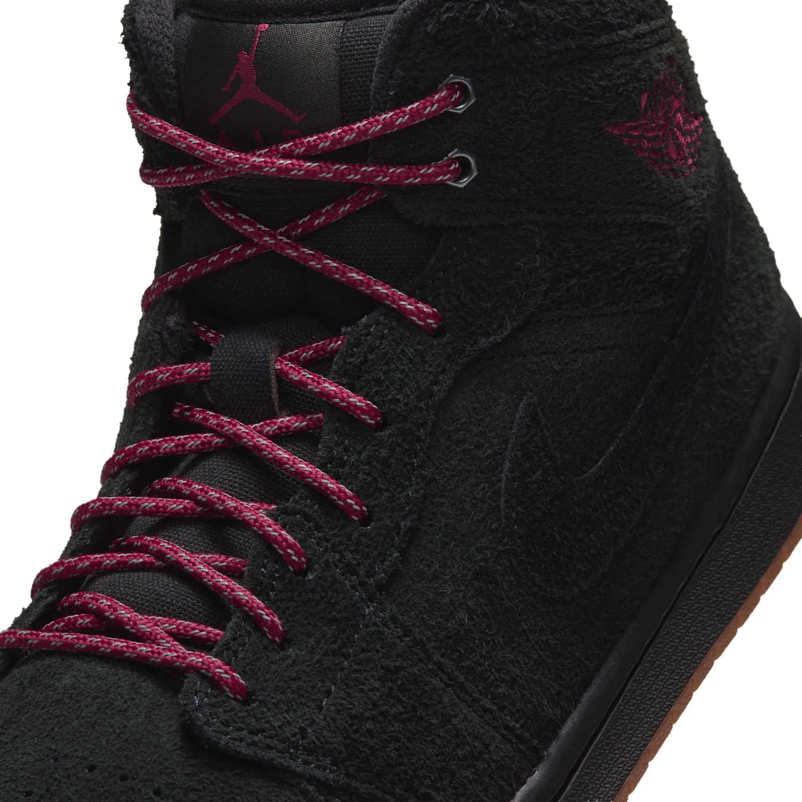 close-up toe and lace detail with burgundy laces and Jumpman tongue logo, Jordan 1 Mid
