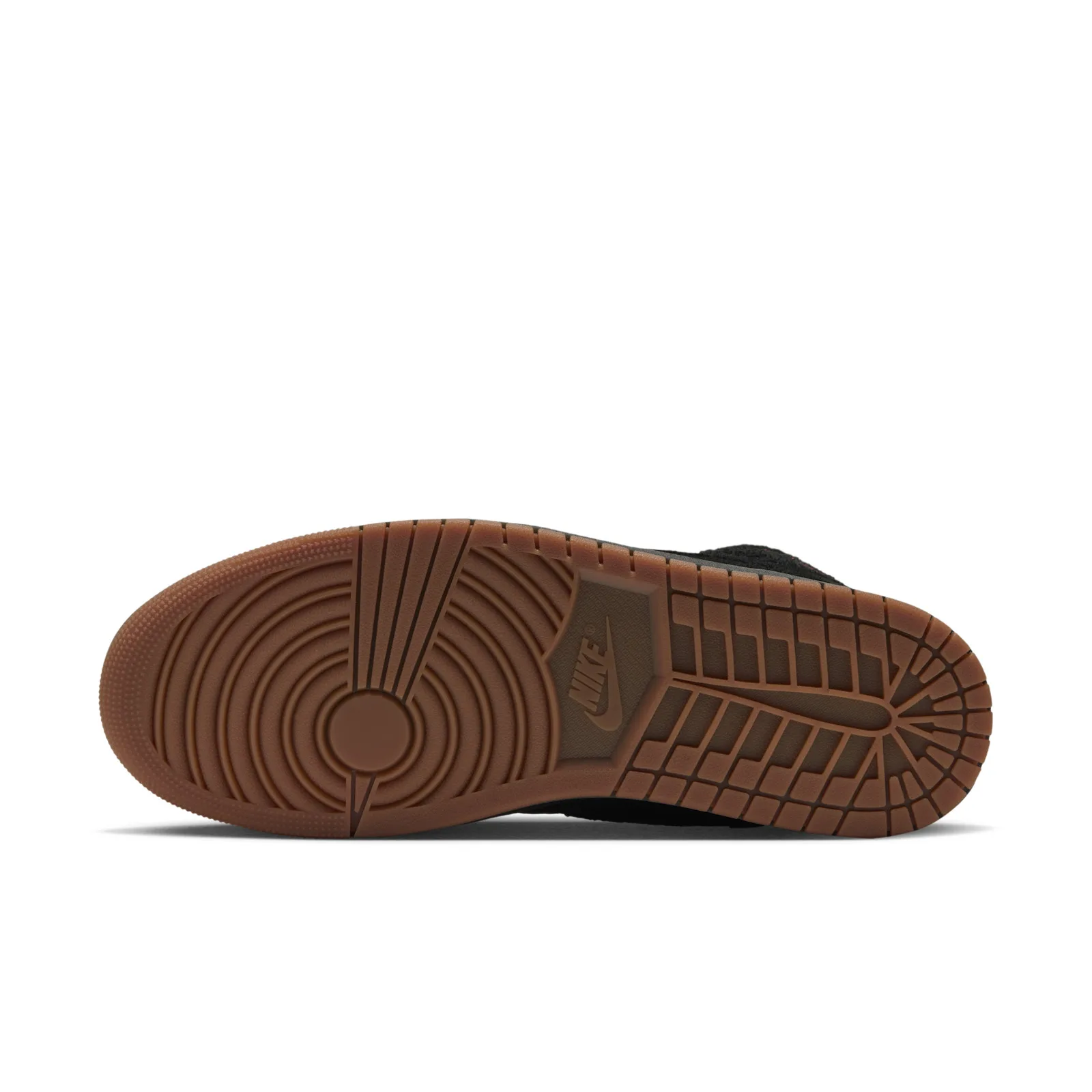 outsole view showing gum rubber tread pattern with Nike logo, Jordan 1 Mid
