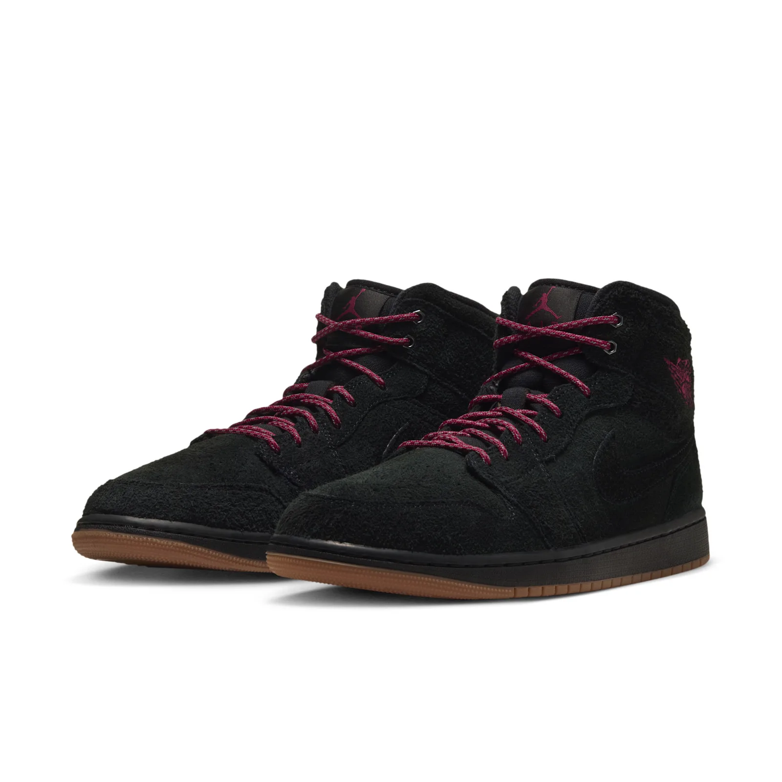 angled pair view, black suede with burgundy laces and gum soles, Jordan 1 Mid
